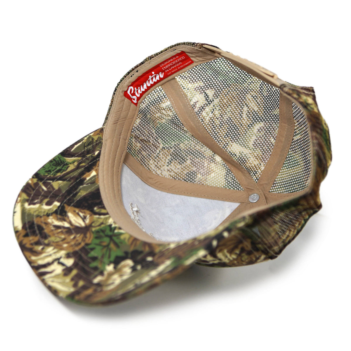 GOOD NOT GREAT CAMO TRUCKER HAT
